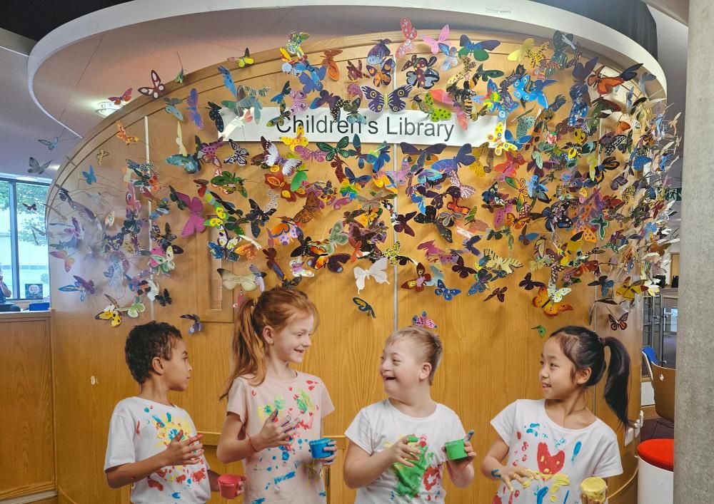 Children painting at Central Library