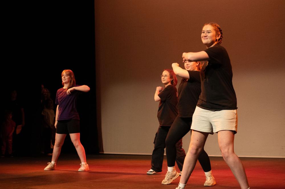Young performers prepare to take to the stage