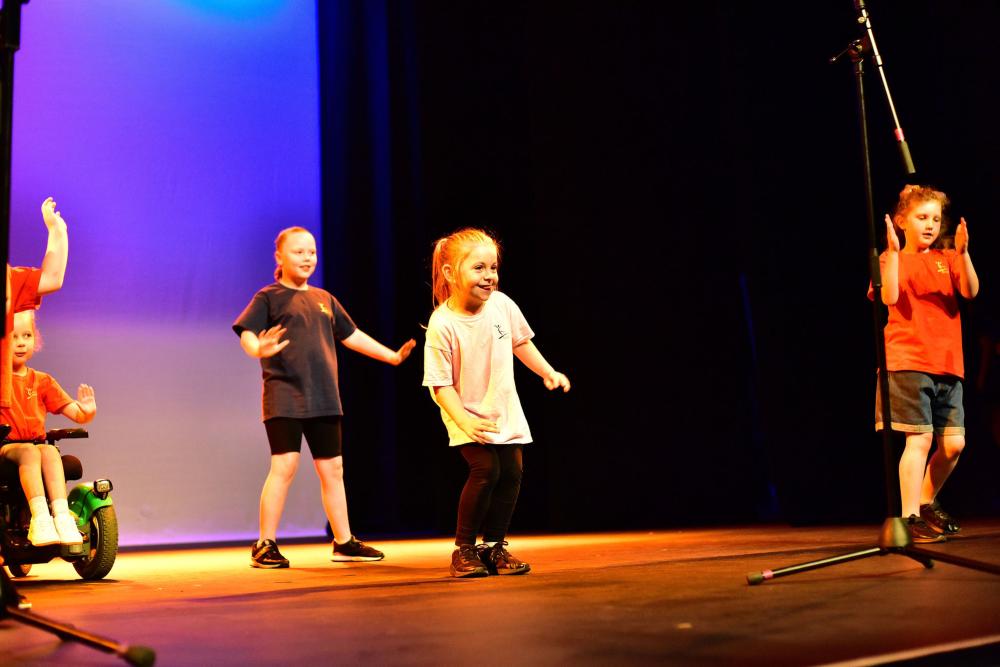 Young performers prepare to take to the stage