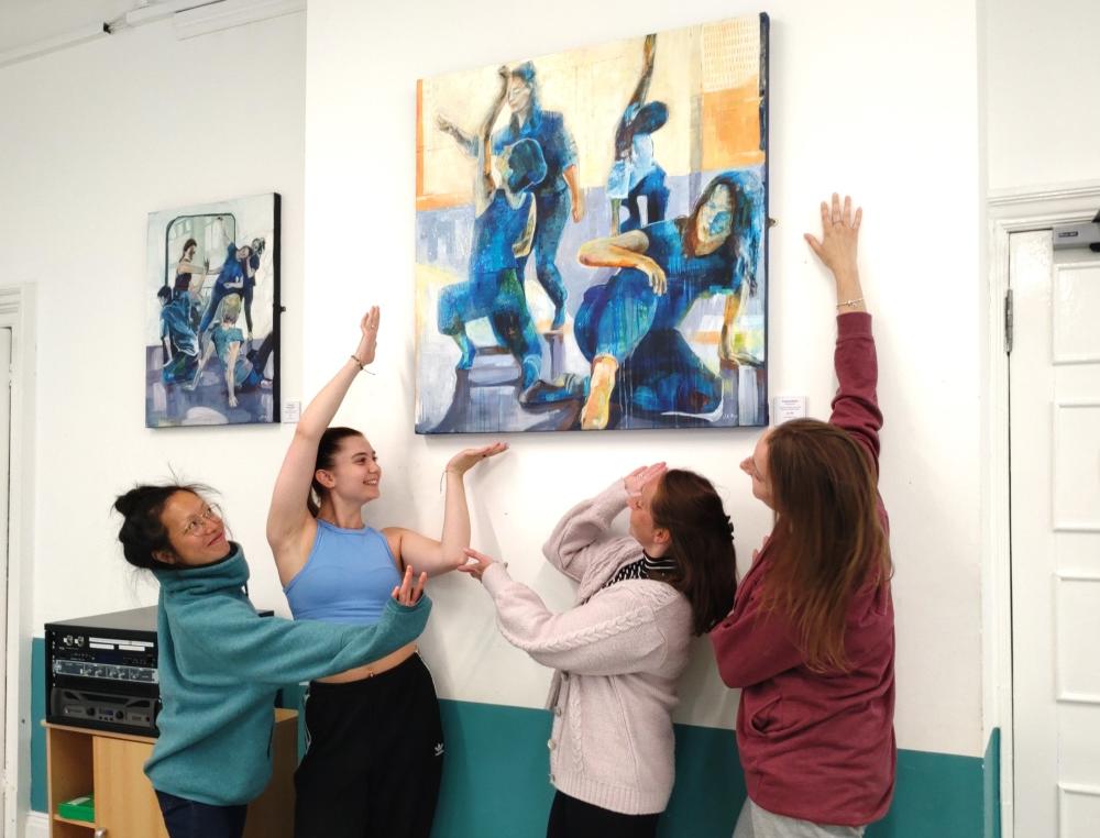 Sarah, Vicky, Maille and Jan-Ming admiring Sheryll’s painting ‘Connections’. The painting features three of the dancers and was inspired by the ‘Making Connections’ inclusive monthly movement sessions which they attend at Swindon Dance.