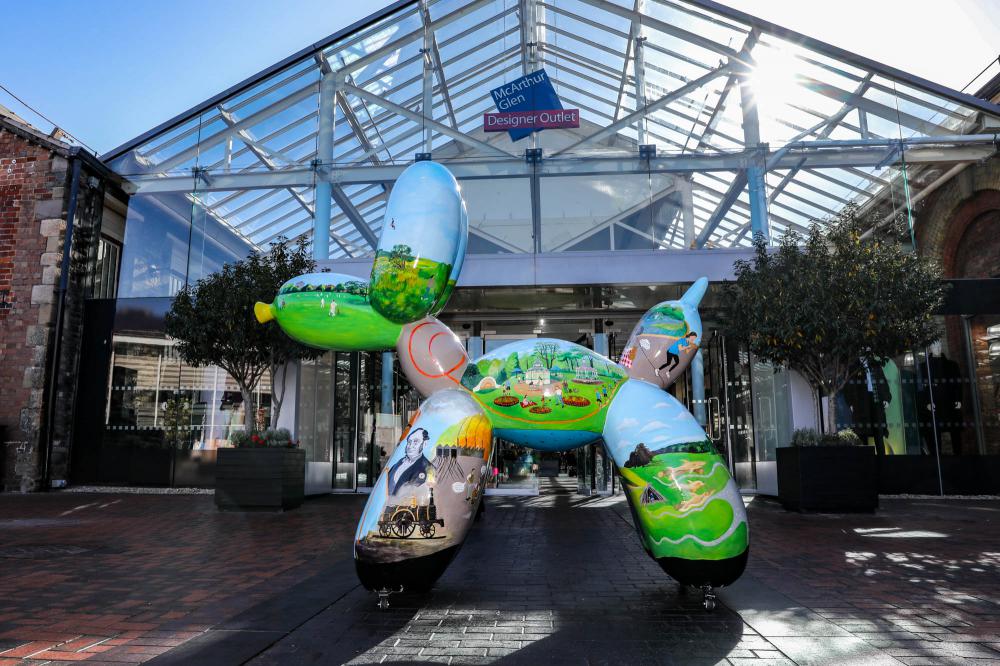 One of the Swindog statues (painted by local artist Hannah Dosanjh) outside the Outlet Centre