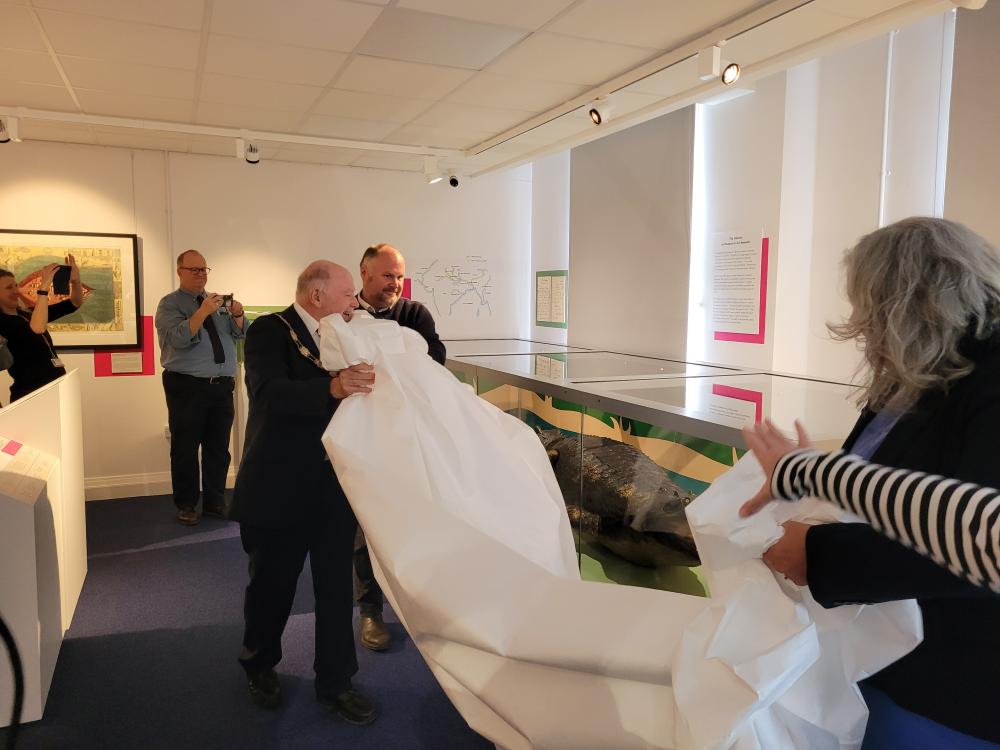 The unveiling of the gharial in its purpose-built cabinet