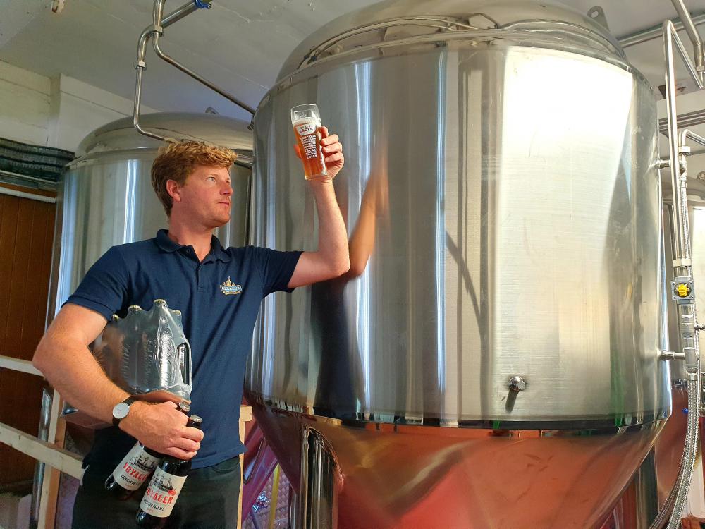 Head brewer Alex Arkell inspects the new ale