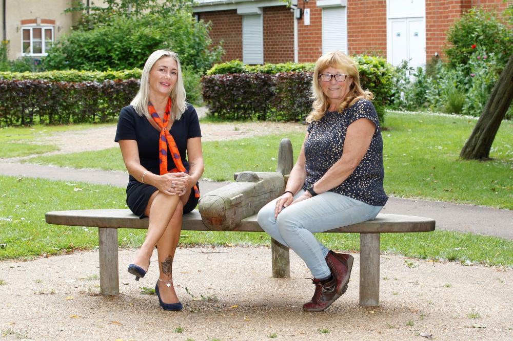 Lucie Elvins, a representative of Bellway (left) and Beverley Margerison, Chair of Vision 4 Wroughton, sitting on the new Spitfire bench in Wroughton