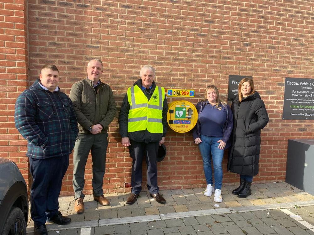 Defibrillator installed thanks to fundraising from Abbey Farm shop