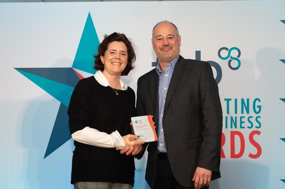 •	Wellbeing success story...Henrietta Boucher from Excalibur Communications of Swindon receives the company’s FSB Award from sponsor Darryl Goddard of Wales and West Utilities