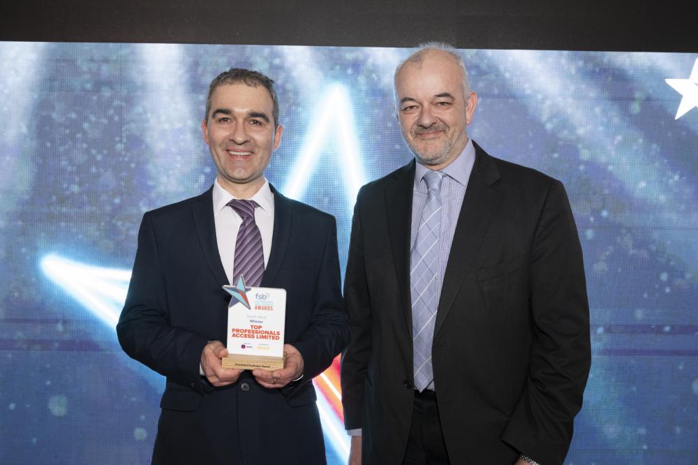 A top prize for Top Professionals Access Limited. Sebastian Kopanski (left) receives the Diversity and Inclusion Award from FSB regional policy champion Craig Carey-Clinch