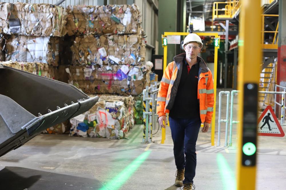 Matt Nicholls, Sands Farm MRF Manager, Hills Waste Solutions, using the FHOSS Illuminated Safety Walkway System at Sands Farm, Calne