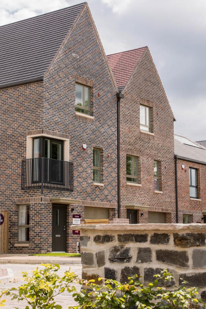 Oakfield completes on first homes in community-centered scheme 