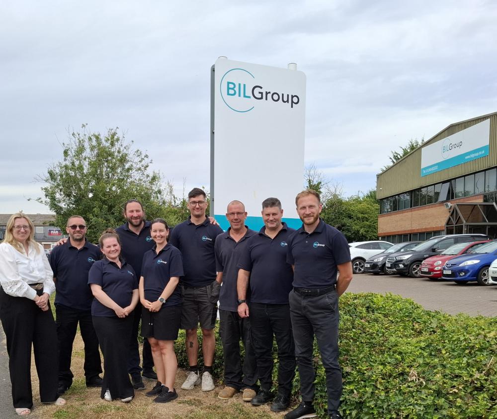 Diane Banister, left, with the delegates from BIL Group