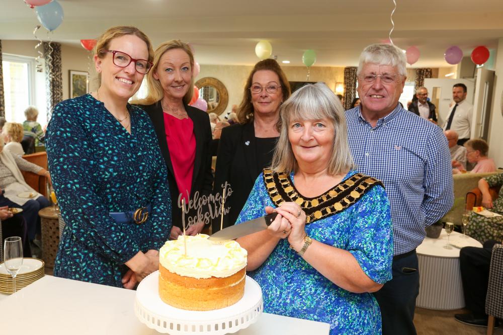 McCarthy Stone Locks View grand opening cake cutting with Mayor