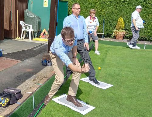 Harry Threlfall and Emerson Phipps of Pebley Beach bowl the first woods of the season at Wroughton Bowls Club