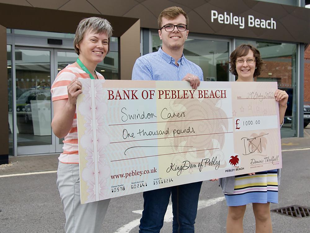 Jill Crooks, left, and Anne Saunders from Swindon Carers Centre with Harry Threlfall, customer services manager at Pebley Beach