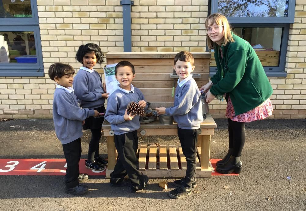 Pupils at badbury Park Primary School with their new outdoor equipment donated by Redrow