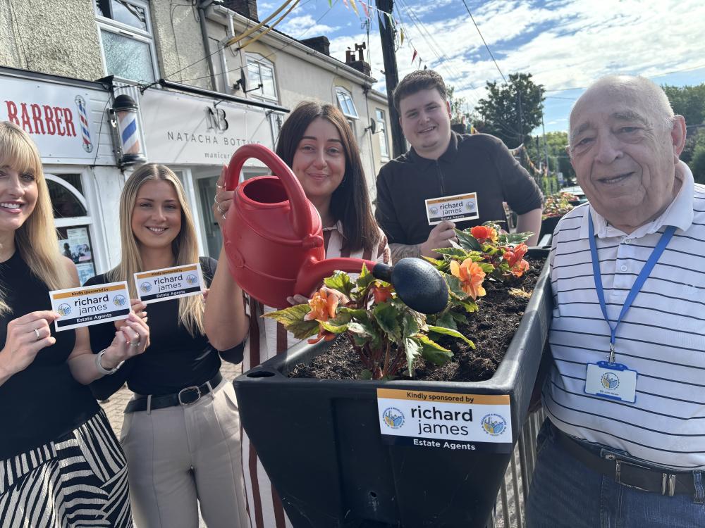 Ellis-Rose Wigley (centre) with Cllr John Hewer and the rest of the Richard James Wroughton team