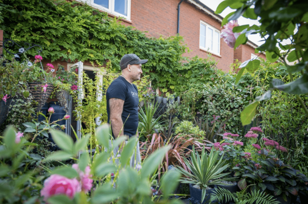 Luke Carpenter in the garden he skilfully tends