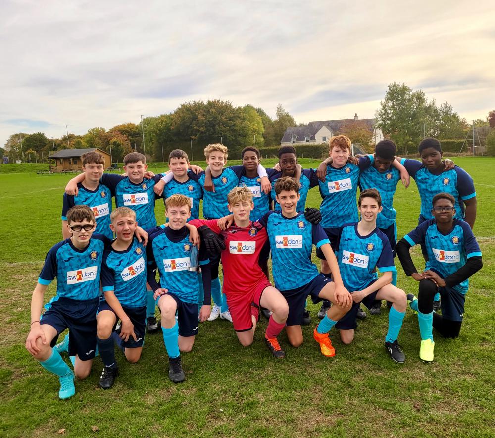 Under-14s football team celebrates league win   with sponsor Swindon’s Bus Company 