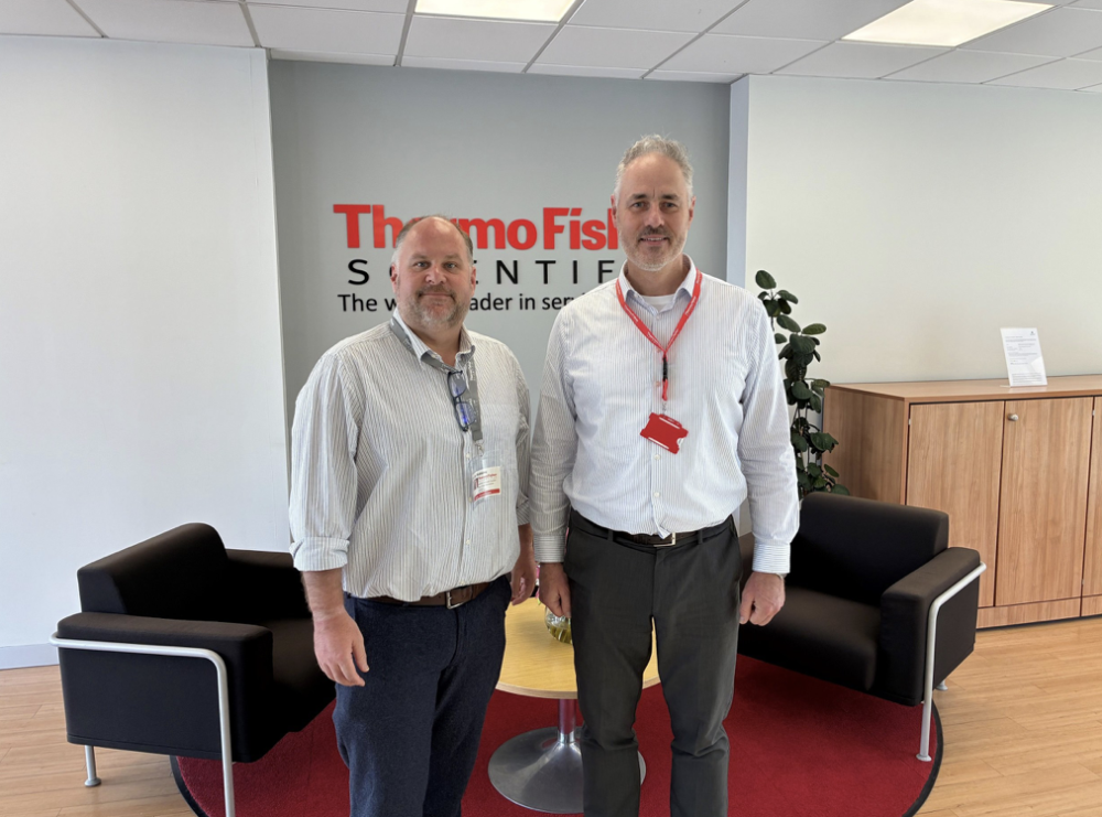 Colin Drummond welcoming Cllr Robbins to the Swindon Thermo Fisher facility