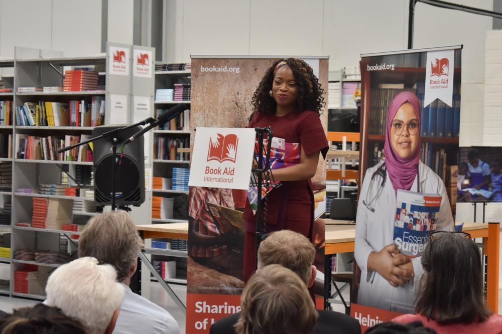 Bestselling author Abi Daré, the charity's 2026 Author Ambassador, speaking to guests about the power of books