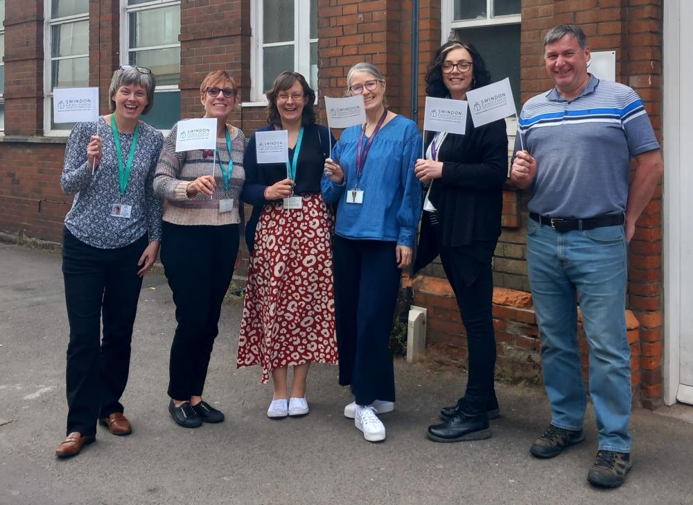 Swindon Carers Centre team members preparing for Carers Week and Walk A Mile