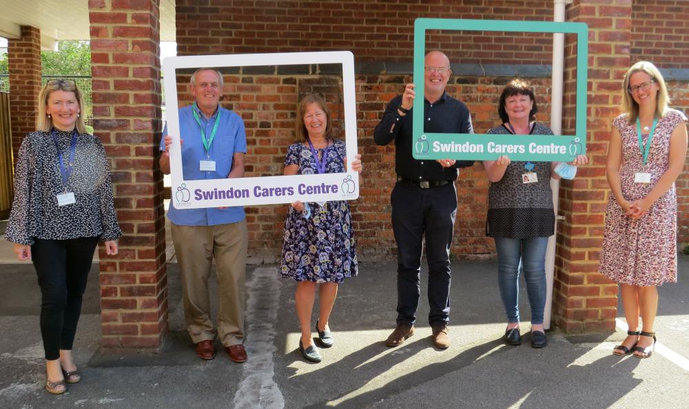 Mark Flay, Volunteer & Partnership Manager at Zurich Community Trust (middle right) with the Swindon Carers Centre team