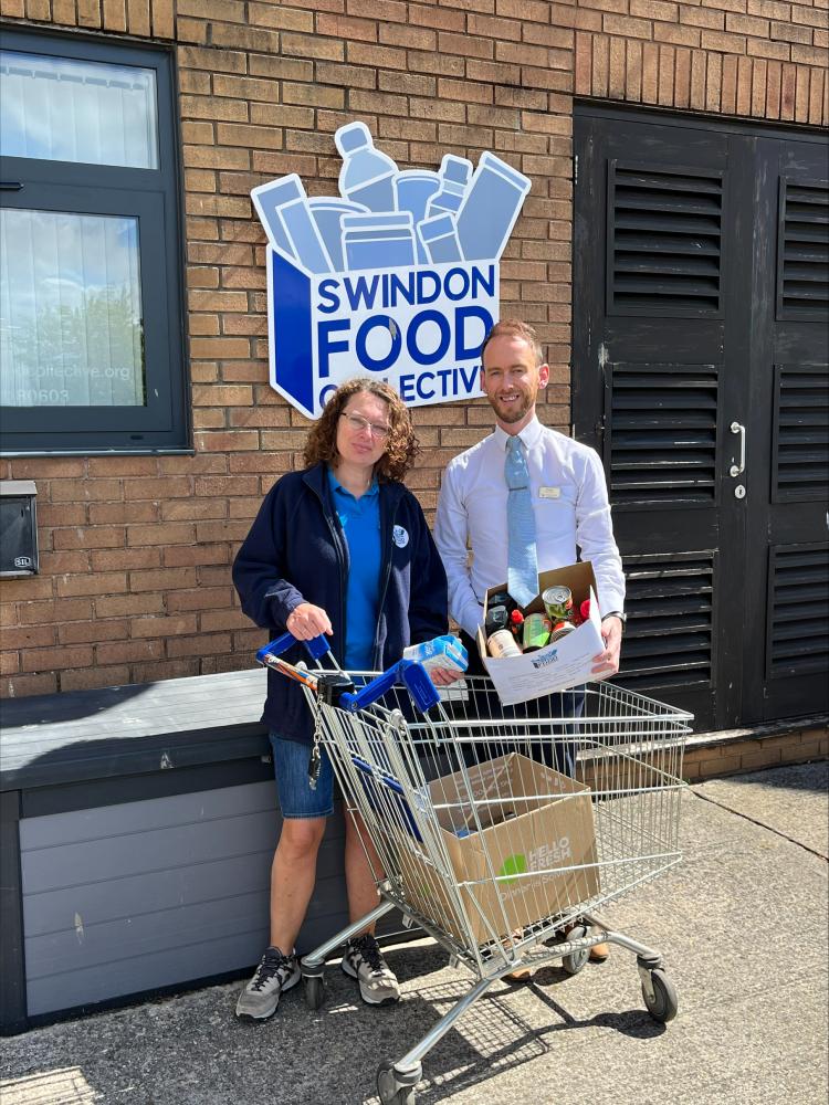 Thomas Hough from Barratt David Wilson Homes South West with Sharon Dowler from the Swindon Food Collective