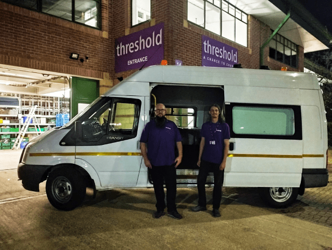 Jason Biggs (left) & Tom Silberberg (right) at Threshold’s warehouse in front of the Night Watch welfare van. 