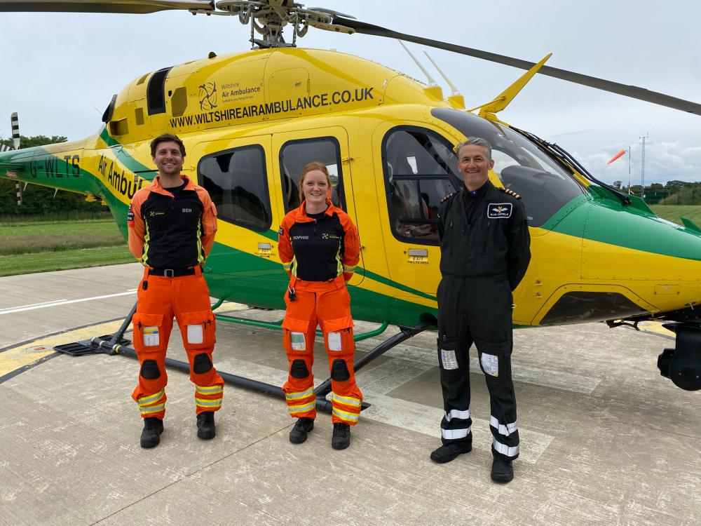 Critical care paramedics Ben Abbott (left) and Sophie Holt alongside Pilot Elvis Costello, alongside Bell 429 helicopter