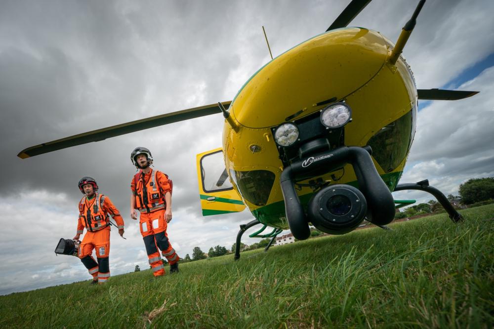 Critical care paramedics Richard Miller, left, and Craig Wilkins exiting the charity’s helicopter