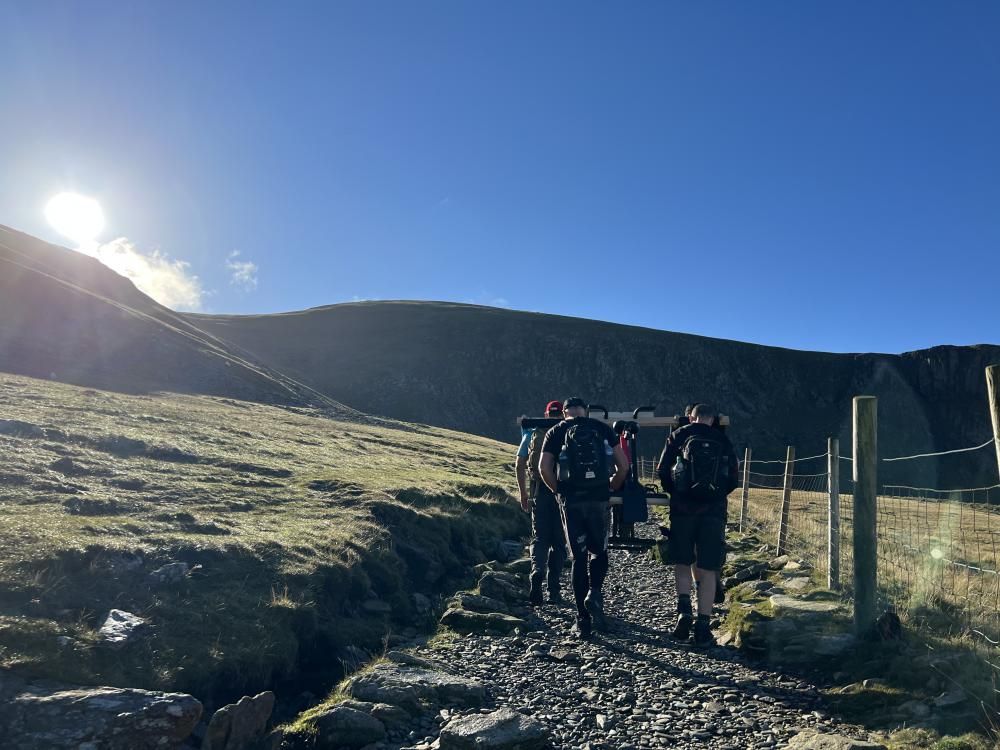 Locals complete epic Snowdon hiking challenge to support cancer charity