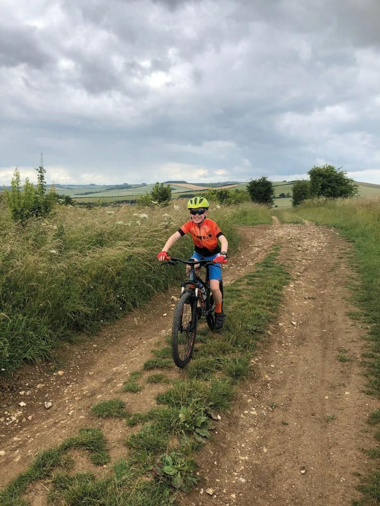 10-year-old Jamie pictured at a previous Macmillan Castles Bike Ride