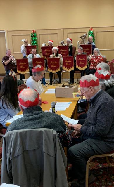 Swindon Brass provides entertainment at Christmas party for 'Tea and