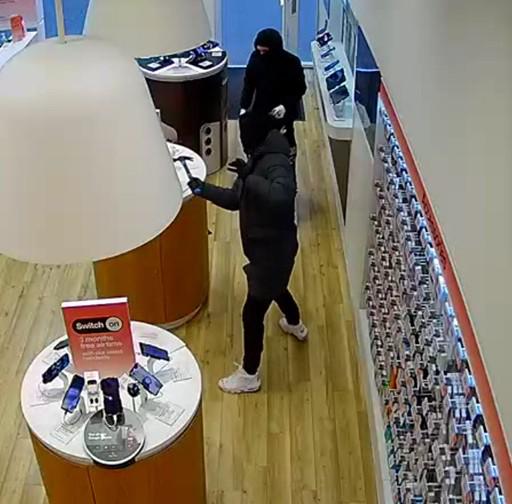 CCTV images released after balaclava-clad males steal iPhones from Swindon store