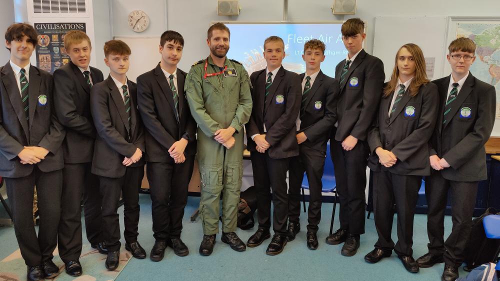 Lieutenant Ollie Mendham pictured with KS4 pupils from Bradon Forest School