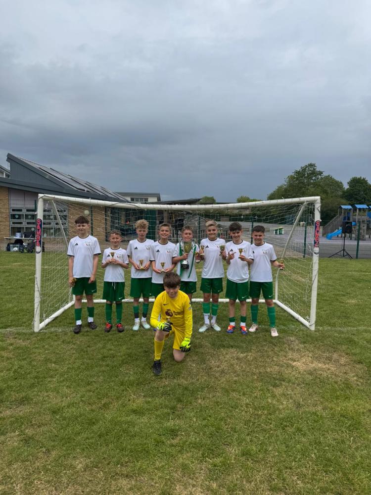 Croft Primary School celebrates hat-trick of football trophies