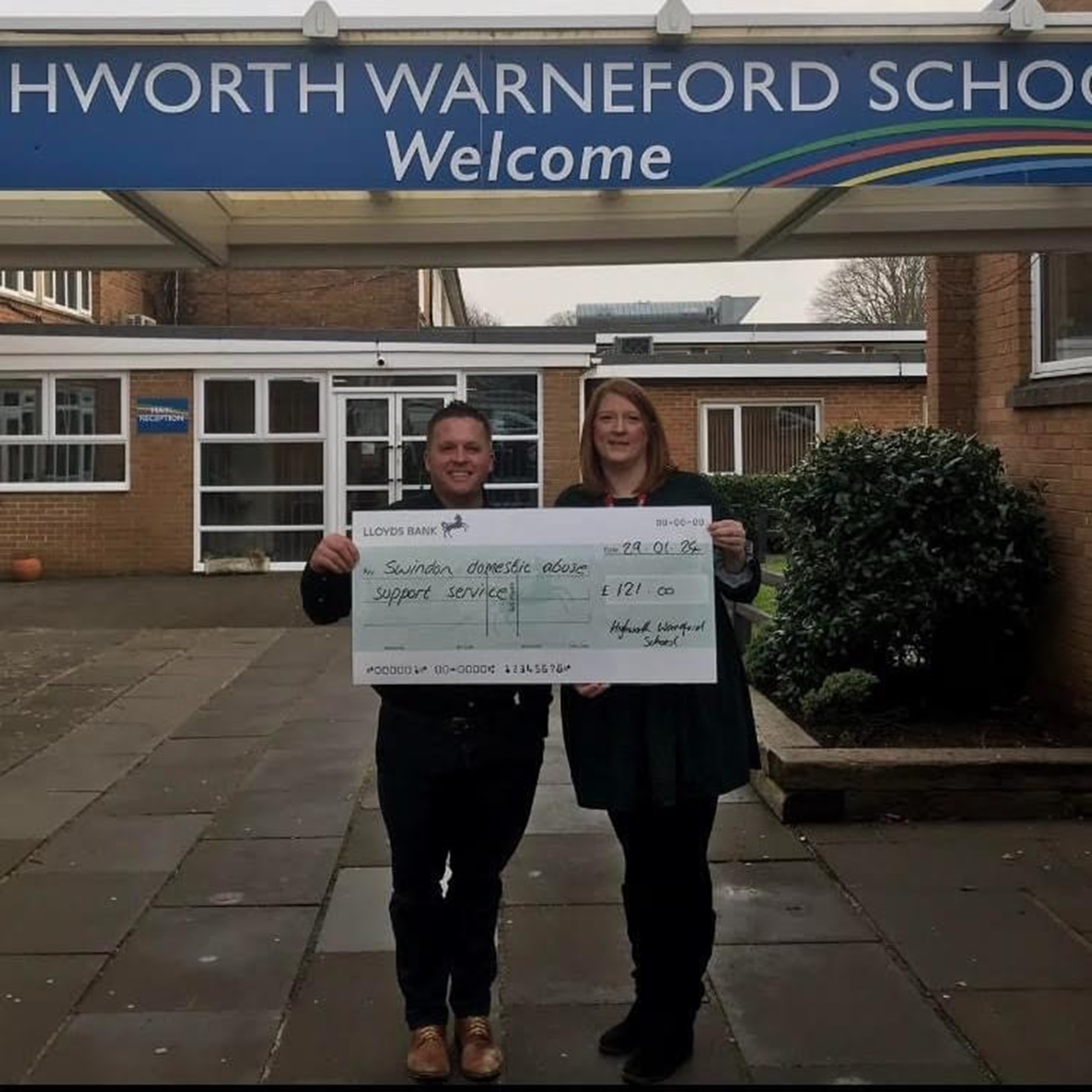 James Hanson presenting the donation from Warneford School to Charlotte Gibbon from SDASS