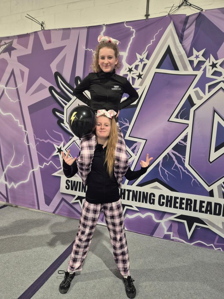 Daisy, bottom, and teammate Immy