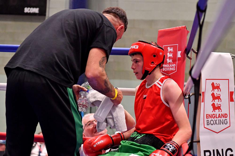 Hayden Young being coached through his semi-final, pictured by Andy Chubb.
