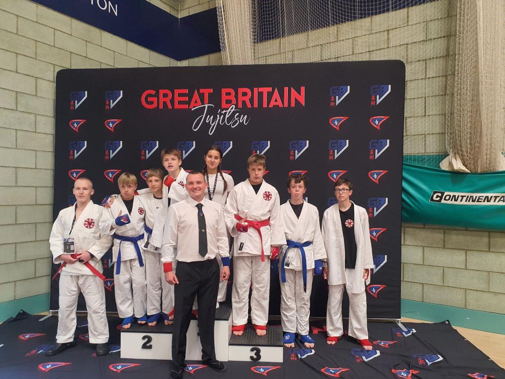 Draco Dojo competitors with Sensei Adam Esz