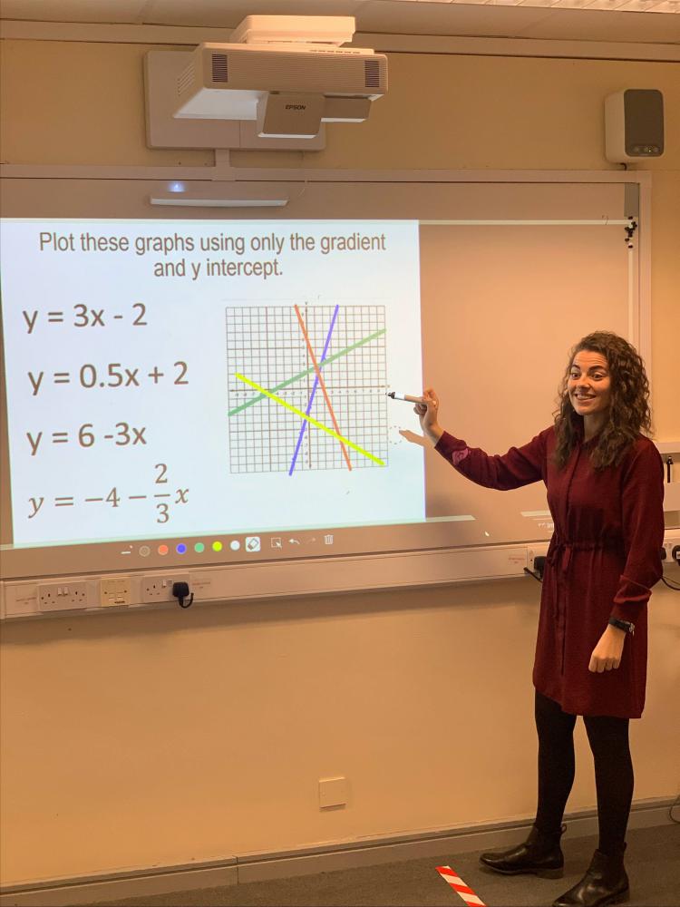 Laura Conroy, head of maths at Lawn Manor Academy, Swindon with the Epson display board