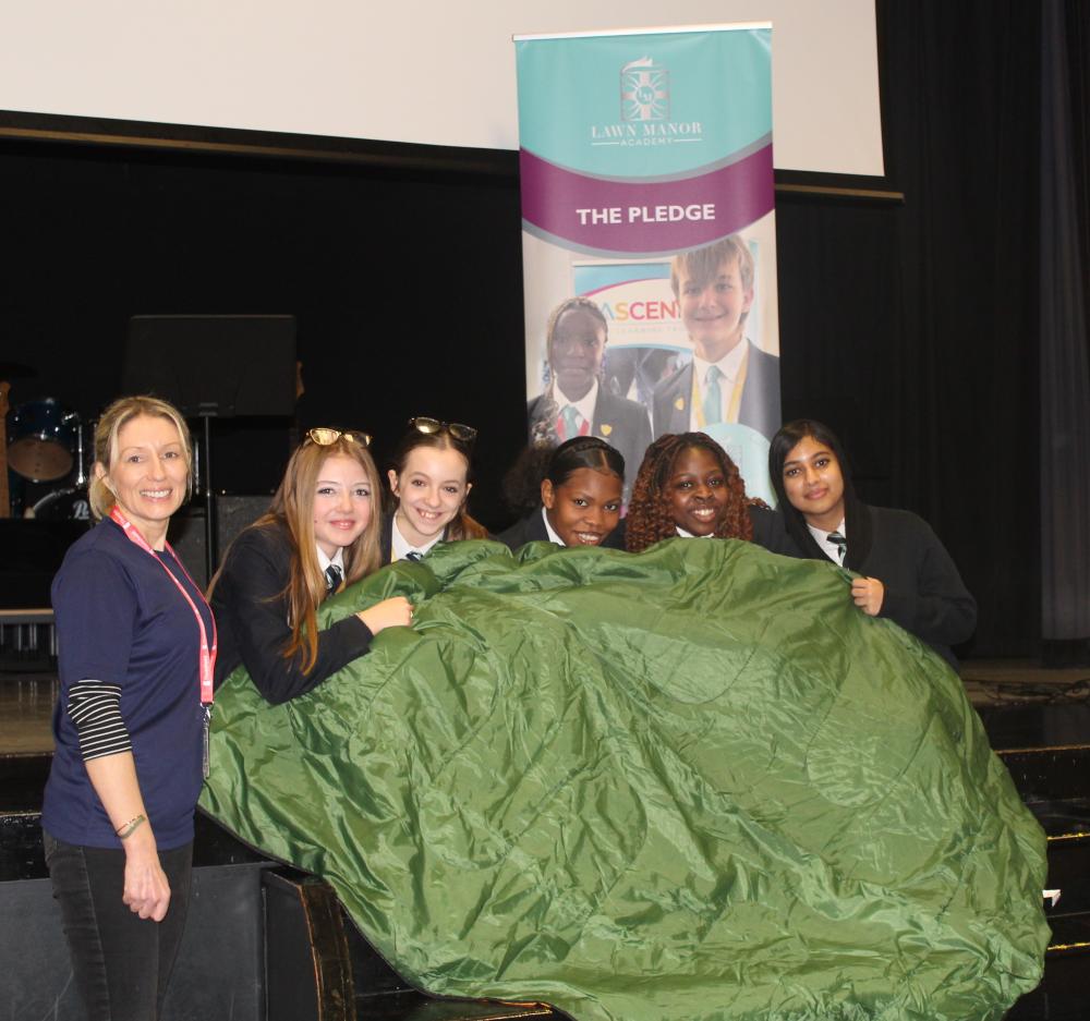 Threshold's Rachel Harris with Lawn Manor Academy pupils ahead of Sleep Out 26