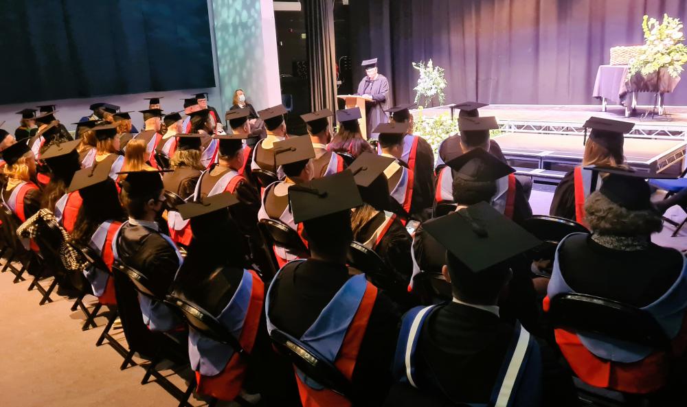 New College higher education students celebrate graduation