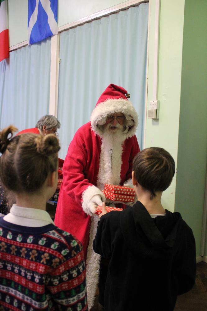 Junior School Welcome Santa for Carol Service