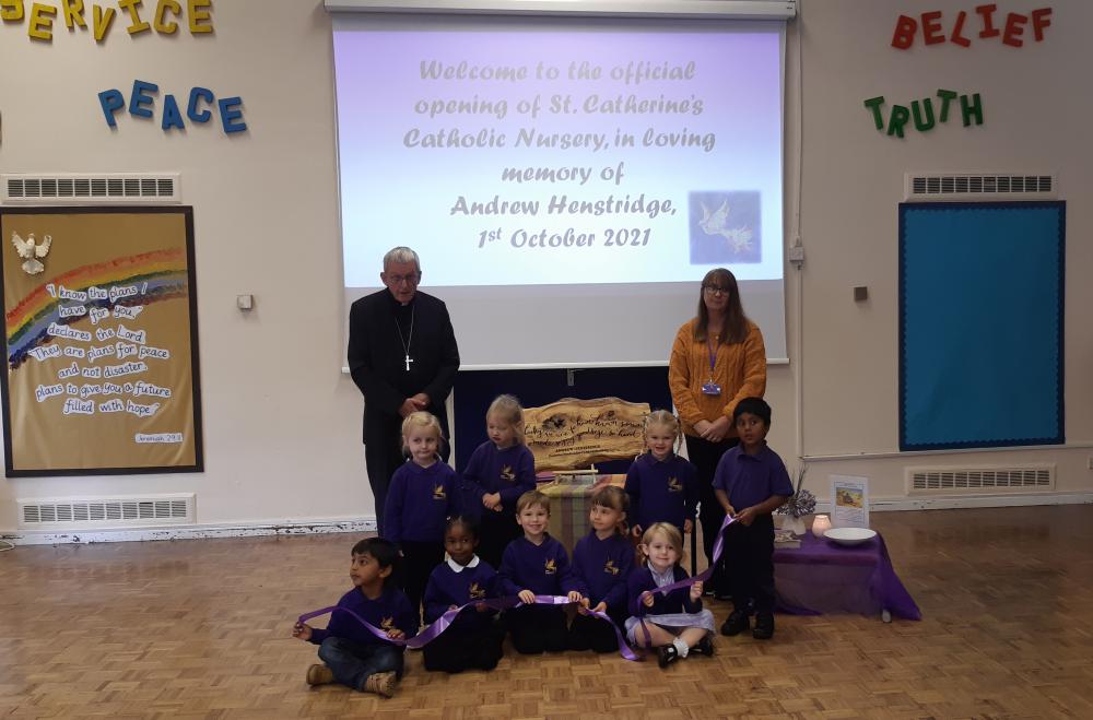 Bishop Declan Lang and Nursery teacher Jo Bailey with some of the nursery pupils