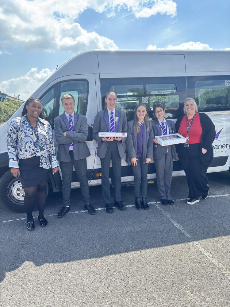 Members of staff Jasmine Byrne, Assistant Head of Year 10, (on far left) and Amanda Mobey, Assistant Head of Year 9, (on far right) with Student Council members during doughnut drop to BE U Swindon during Mental Health Awareness Week (Picture: TPAT)
