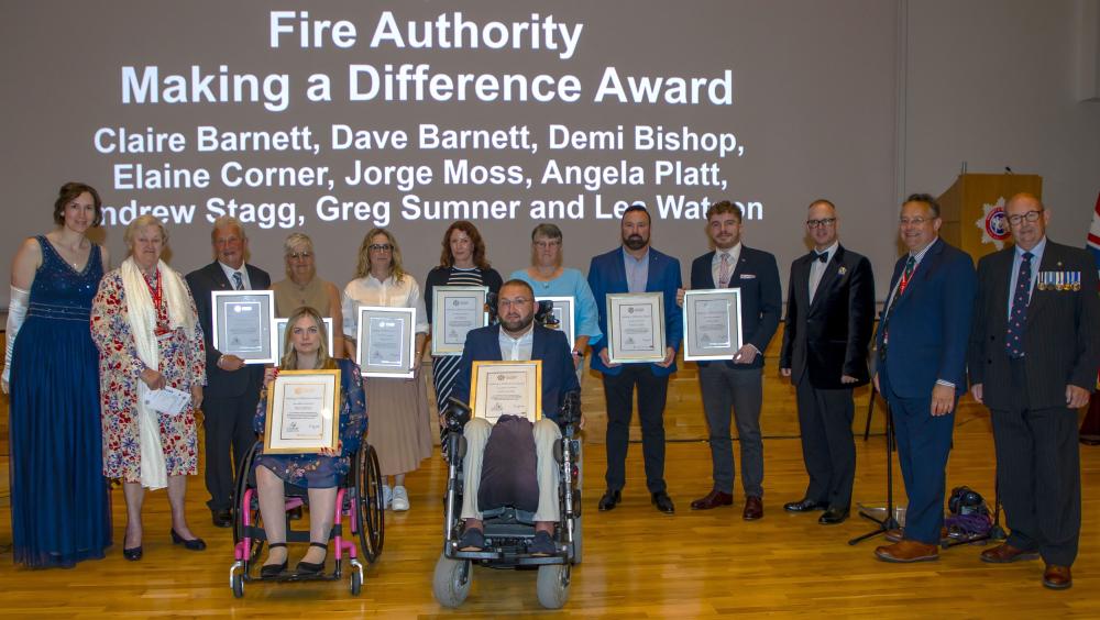 The Safe Drive Stay Alive volunteers with members of the Fire and Rescue Authority, including Vice Chair Cllr Clare Weight (far left) and Chair Cllr Paul Oatway QPM (far right)