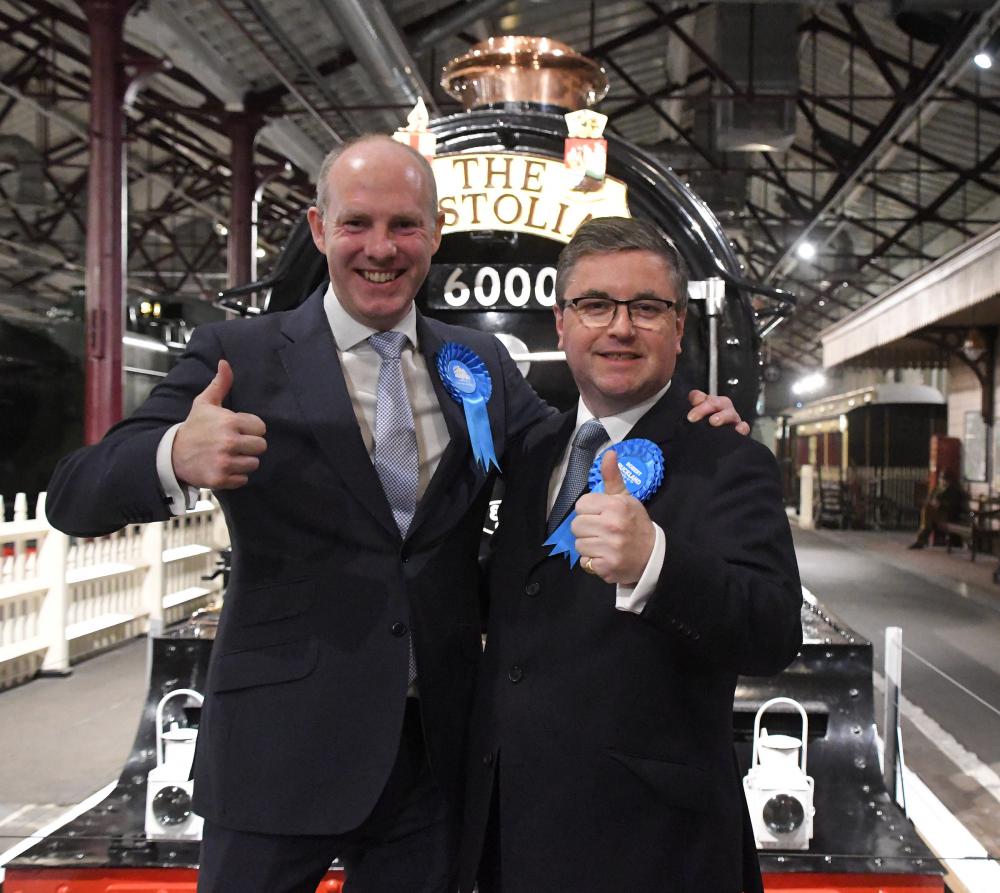 North Swindon MP Justin Tomlinson and South Swindon MP Robert Buckland celebrating after their 2019 General Election win