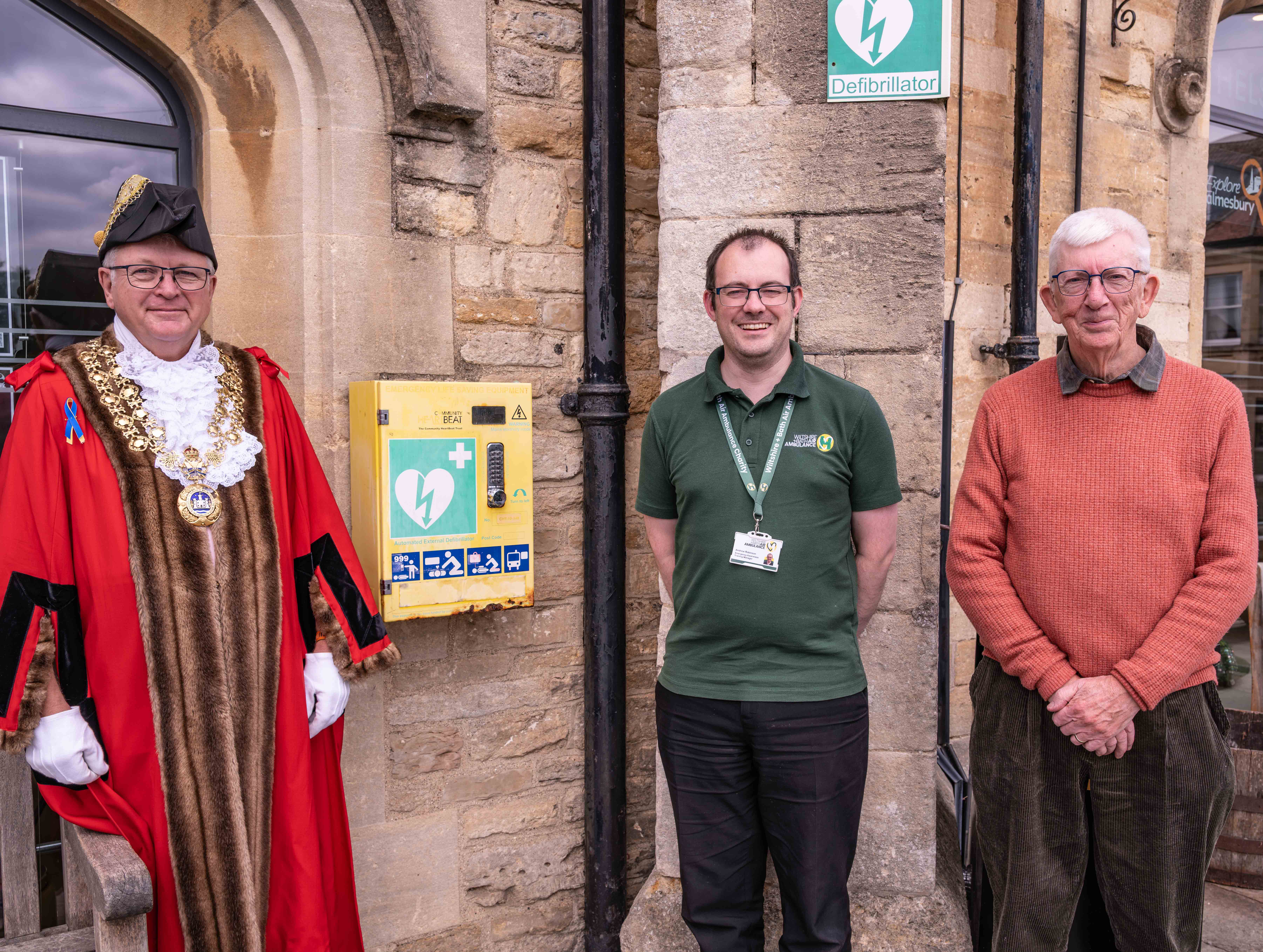 From left: Malmesbury Mayor Cllr Robert Hastings, Andrew Robinson of Wiltshire and Bath Air Ambulance and Chas Gould from Malmesbury League of Friends