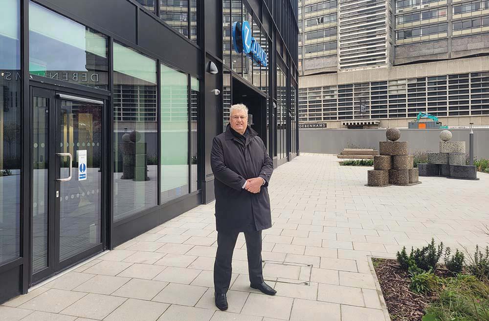 Swindon Borough Council leader Cllr David Renard outside the recently completed Zurich building, Unity Place
