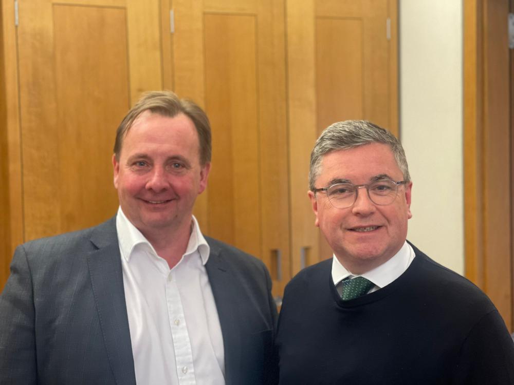 Sir Robert Buckland KBE KC MP picutred with Mountain Warehouse Founder and CEO Mark Neale